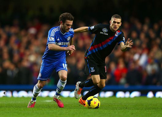 LONDON, ENGLAND - DECEMBER 14: Juan Mata of Chelsea is marked by Stuart O'Keefe of Crystal Palace during the Barclays Premier League match between Chelsea and Crystal Palace at Stamford Bridge on December 14, 2013 in London, England. (Photo by Paul Gilham/Getty Images) 