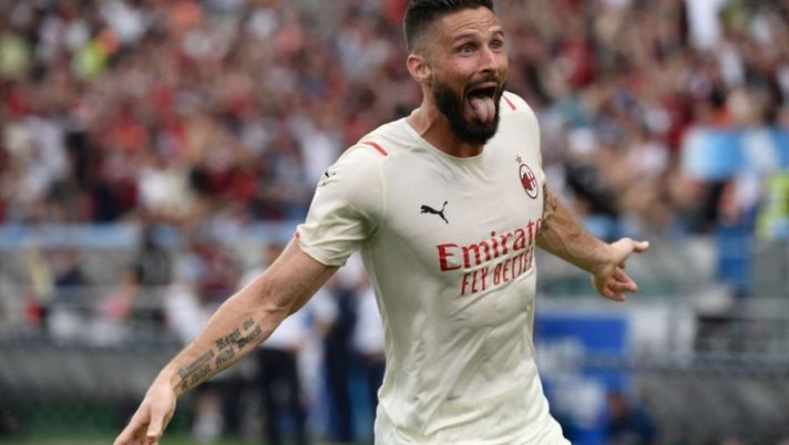 TOPSHOT - AC Milan's French forward Olivier Giroud celebrates after scoring his second goal during the Italian Serie A football match between Sassuolo and AC Milan on May 22, 2022 at the Mapei - Citta del Tricolore stadium in Sassuolo. (Photo by Filippo MONTEFORTE / AFP) (Photo by FILIPPO MONTEFORTE/AFP via Getty Images) Voti fantacalcio: Giroud come Correa, che voto a Leao! Berardi e Caputo più di Scamacca - immagine 1