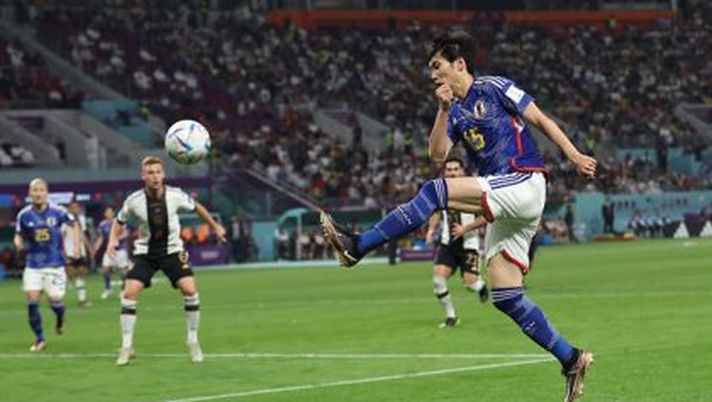 DOHA, QATAR - NOVEMBER 23: Daichi Kamada of Japan shoots the ball during the FIFA World Cup Qatar 2022 Group E match between Germany and Japan at Khalifa International Stadium on November 23, 2022 in Doha, Qatar. (Photo by Alex Grimm/Getty Images) Mondiali, Giappone batte la Germania: non accadeva da… Holly e Benji! - immagine 1