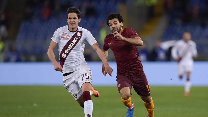 ROME, ITALY - FEBRUARY 19:  AS Roma player Mohamed Salah (R) competes with FC Torino player Sasa Lukic during the Serie A match between AS Roma and FC Torino at Stadio Olimpico on February 19, 2017 in Rome, Italy.  (Photo by Luciano Rossi/AS Roma via Getty Images) 