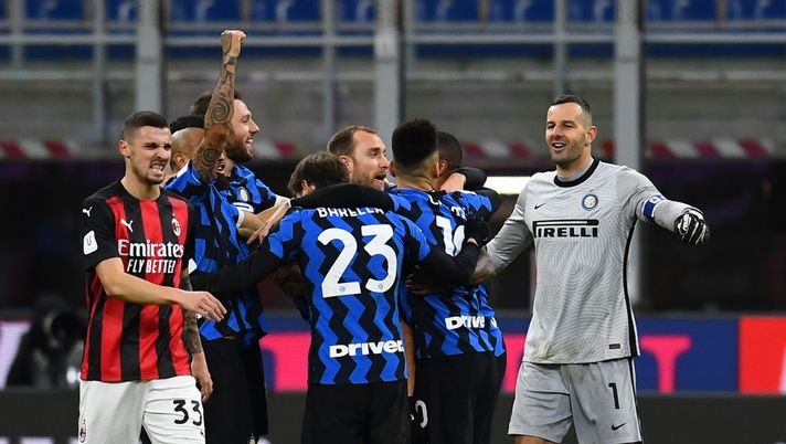 MILAN, ITALY - JANUARY 26: Christian Eriksen of FC Internazionale celebrates with team-mates after scoring the gaol during the Coppa Italia match between FC Internazionale and AC Milan at Stadio Giuseppe Meazza on January 26, 2021 in Milan, Italy. Sporting stadiums around Italy remain under strict restrictions due to the Coronavirus Pandemic as Government social distancing laws prohibit fans inside venues resulting in games being played behind closed doors. (Photo by Claudio Villa - Inter/Inter via Getty Images) MILAN, ITALY - JANUARY 26: Christian Eriksen of FC Internazionale celebrates with team-mates after scoring the gaol during the Coppa Italia match between FC Internazionale and AC Milan at Stadio Giuseppe Meazza on January 26, 2021 in Milan, Italy. Sporting stadiums around Italy remain under strict restrictions due to the Coronavirus Pandemic as Government social distancing laws prohibit fans inside venues resulting in games being played behind closed doors. (Photo by Claudio Villa - Inter/Inter via Getty Images)