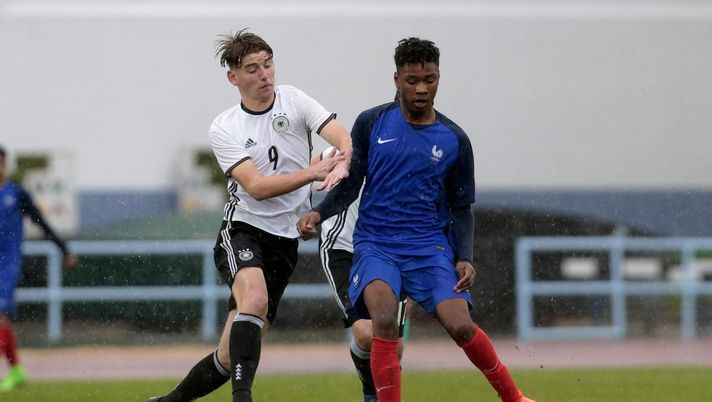 VILA REAL SANTO ANTÓNIO, PORTUGAL - FEBRUARY 11: Ole Pohlmann (L) of Germany U16 challenges Khephren Thuram Ulien (R) of France U16 during the UEFA Development Tournament Match between Germany U16 and France U16 on February 11, 2017 in Vila Real Santo António, Portugal. (Photo by Filipe Farinha/Getty Images) VILA REAL SANTO ANTÓNIO, PORTUGAL - FEBRUARY 11: Ole Pohlmann (L) of Germany U16 challenges Khephren Thuram Ulien (R) of France U16 during the UEFA Development Tournament Match between Germany U16 and France U16 on February 11, 2017 in Vila Real Santo António, Portugal. (Photo by Filipe Farinha/Getty Images)