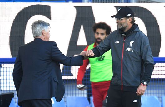 LIVERPOOL, ENGLAND - JUNE 21: Carlo Ancelotti, Manager of Everton interacts with Jurgen Klopp, Manager of Liverpool after the Premier League match between Everton FC and Liverpool FC at Goodison Park on June 21, 2020 in Liverpool, England. Football Stadiums around Europe remain empty due to the Coronavirus Pandemic as Government social distancing laws prohibit fans inside venues resulting in all fixtures being played behind closed doors. (Photo by Peter Powell/Pool via Getty Images) LIVERPOOL, ENGLAND - JUNE 21: Carlo Ancelotti, Manager of Everton interacts with Jurgen Klopp, Manager of Liverpool after the Premier League match between Everton FC and Liverpool FC at Goodison Park on June 21, 2020 in Liverpool, England. Football Stadiums around Europe remain empty due to the Coronavirus Pandemic as Government social distancing laws prohibit fans inside venues resulting in all fixtures being played behind closed doors. (Photo by Peter Powell/Pool via Getty Images)