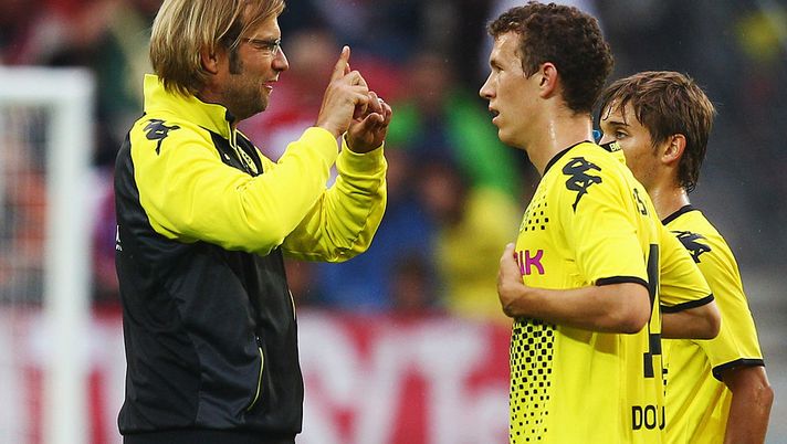 MAINZ, GERMANY - JULY 19: Head coach Juergen Klopp (L) of Dortmund talks to Ivan Perisic after the LIGA total! Cup semifinal match between FSV Mainz 05 and Borussia Dortmund at Coface Arena on July 19, 2011 in Mainz, Germany.  (Photo by Alex Grimm/Bongarts/Getty Images) 