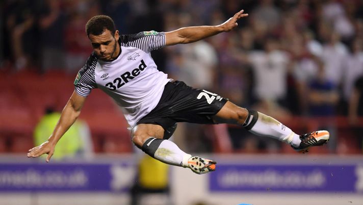 NOTTINGHAM, ENGLAND - AUGUST 27: Brice Samba of Nottingham Forest saves at the feet of Mason Bennett of DerbyCounty during the Carabao Cup Second Round match between Nottingham Forest and Derby County at City Ground on August 27, 2019 in Nottingham, England. (Photo by Laurence Griffiths/Getty Images) 
