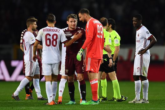 TURIN, ITALY - APRIL 18: Andrea Belotti (C) of Torino FC and Gianluigi Donnarumma of AC Milan at the end of the Serie A match between Torino FC and AC Milan at Stadio Olimpico di Torino on April 18, 2018 in Turin, Italy. (Photo by Valerio Pennicino/Getty Images) TURIN, ITALY - APRIL 18: Andrea Belotti (C) of Torino FC and Gianluigi Donnarumma of AC Milan at the end of the Serie A match between Torino FC and AC Milan at Stadio Olimpico di Torino on April 18, 2018 in Turin, Italy. (Photo by Valerio Pennicino/Getty Images)