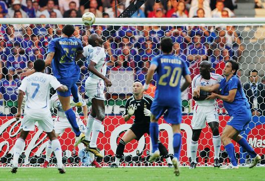 BERLIN - JULY 09:  Marco Materazzi of Italy scores his team's first goal during the FIFA World Cup Germany 2006 Final match between Italy and France at the Olympic Stadium on July 9, 2006 in Berlin, Germany.  (Photo by Alex Livesey/Getty Images) 