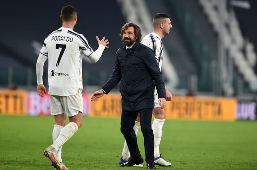 Andrea Pirlo e Cristiano Ronaldo esultano insieme dopo una vittoria Andrea Pirlo e Cristiano Ronaldo esultano insieme dopo una vittoria