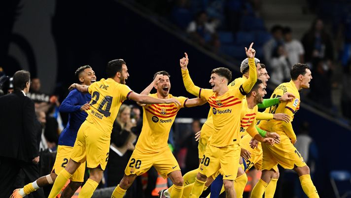 BARCELONA, SPAIN - MAY 14: (L-R) Rafinha, Eric Garcia, Gavi, Sergi Roberto and Ferran Torres of FC Barcelona celebrate winning the LaLiga Santander Title after victory in the LaLiga Santander match between RCD Espanyol and FC Barcelona at RCDE Stadium on May 14, 2023 in Barcelona, Spain. (Photo by David Ramos/Getty Images) Champions League