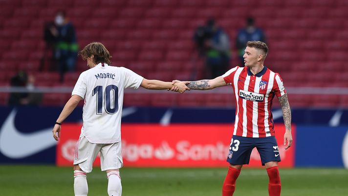 MADRID, SPAIN - MARCH 07: Kieran Trippier of Atletico de Madrid shakes hands with Luka Modric of Real Madrid following the La Liga Santander match between Atletico de Madrid and Real Madrid at Estadio Wanda Metropolitano on March 07, 2021 in Madrid, Spain. Sporting stadiums around Spain remain under strict restrictions due to the Coronavirus Pandemic as Government social distancing laws prohibit fans inside venues resulting in games being played behind closed doors. (Photo by Denis Doyle/Getty Images) MADRID, SPAIN - MARCH 07: Kieran Trippier of Atletico de Madrid shakes hands with Luka Modric of Real Madrid following the La Liga Santander match between Atletico de Madrid and Real Madrid at Estadio Wanda Metropolitano on March 07, 2021 in Madrid, Spain. Sporting stadiums around Spain remain under strict restrictions due to the Coronavirus Pandemic as Government social distancing laws prohibit fans inside venues resulting in games being played behind closed doors. (Photo by Denis Doyle/Getty Images)
