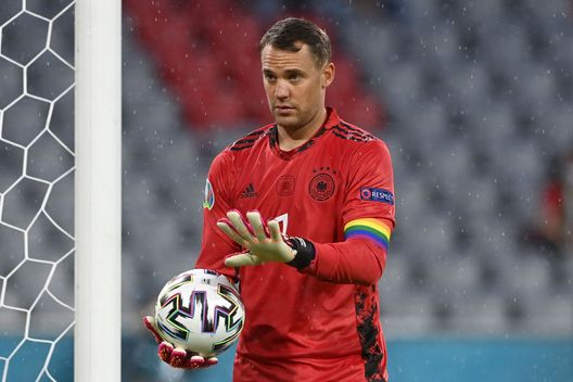 MUNICH, GERMANY - JUNE 23: Manuel Neuer of Germany reacts as he wears a rainbow armband during the UEFA Euro 2020 Championship Group F match between Germany and Hungary at Allianz Arena on June 23, 2021 in Munich, Germany. (Photo by Christof Stache - Pool/Getty Images) MUNICH, GERMANY - JUNE 23: Manuel Neuer of Germany reacts as he wears a rainbow armband during the UEFA Euro 2020 Championship Group F match between Germany and Hungary at Allianz Arena on June 23, 2021 in Munich, Germany. (Photo by Christof Stache - Pool/Getty Images)