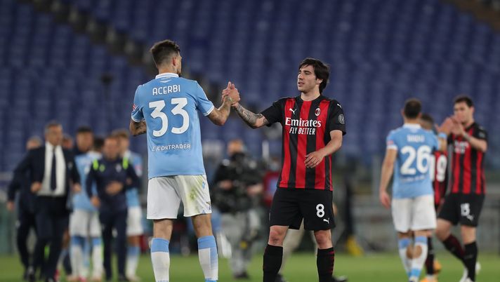 ROME, ITALY - APRIL 26: Sandro Tonali of A.C. Milan interacts with Francesco Acerbi of SS Lazio after the Serie A match between SS Lazio and AC Milan at Stadio Olimpico on April 26, 2021 in Rome, Italy. Sporting stadiums around Italy remain under strict restrictions due to the Coronavirus Pandemic as Government social distancing laws prohibit fans inside venues resulting in games being played behind closed doors. (Photo by Paolo Bruno/Getty Images) ROME, ITALY - APRIL 26: Sandro Tonali of A.C. Milan interacts with Francesco Acerbi of SS Lazio after the Serie A match between SS Lazio and AC Milan at Stadio Olimpico on April 26, 2021 in Rome, Italy. Sporting stadiums around Italy remain under strict restrictions due to the Coronavirus Pandemic as Government social distancing laws prohibit fans inside venues resulting in games being played behind closed doors. (Photo by Paolo Bruno/Getty Images)