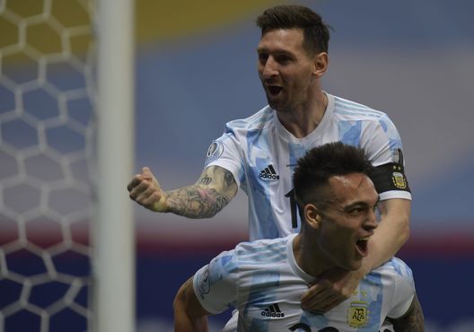 BRASILIA, BRAZIL - JULY 06: Lautaro Martinez of Argentina celebrates with teammate Lionel Messi after scoring the first goal of his team during a semi-final match of Copa America Brazil 2021 between Argentina and Colombia at Mane Garrincha Stadium on July 06, 2021 in Brasilia, Brazil. (Photo by Pedro Vilela/Getty Images) BRASILIA, BRAZIL - JULY 06: Lautaro Martinez of Argentina celebrates with teammate Lionel Messi after scoring the first goal of his team during a semi-final match of Copa America Brazil 2021 between Argentina and Colombia at Mane Garrincha Stadium on July 06, 2021 in Brasilia, Brazil. (Photo by Pedro Vilela/Getty Images)