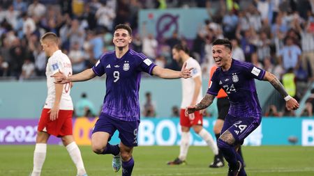 DOHA, QATAR - NOVEMBER 30: Julian Alvarez of Argentina celebrates after scoring their team's second goal during the FIFA World Cup Qatar 2022 Group C match between Poland and Argentina at Stadium 974 on November 30, 2022 in Doha, Qatar. (Photo by Clive Brunskill/Getty Images)