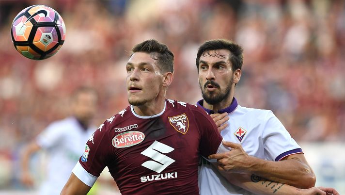 TURIN, ITALY - OCTOBER 02:  Andrea Belotti (L) of FC Torino is challenged by Davide Astori of ACF Fiorentina during the Serie A match between FC Torino and ACF Fiorentina at Stadio Olimpico di Torino on October 2, 2016 in Turin, Italy.  (Photo by Valerio Pennicino/Getty Images) 