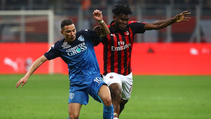MILAN, ITALY - FEBRUARY 22: Ismael Bennacer of Empoli competes for the ball with Franck Kessie of AC Milan during the Serie A match between AC Milan and Empoli at Stadio Giuseppe Meazza on February 22, 2019 in Milan, Italy. (Photo by Marco Luzzani/Getty Images) MILAN, ITALY - FEBRUARY 22: Ismael Bennacer of Empoli competes for the ball with Franck Kessie of AC Milan during the Serie A match between AC Milan and Empoli at Stadio Giuseppe Meazza on February 22, 2019 in Milan, Italy. (Photo by Marco Luzzani/Getty Images)