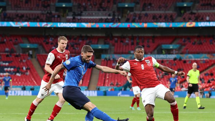 LONDON, ENGLAND - JUNE 26: Domenico Berardi of Italy shoots whilst under pressure from David Alaba of Austria during the UEFA Euro 2020 Championship Round of 16 match between Italy and Austria at Wembley Stadium at Wembley Stadium on June 26, 2021 in London, England. (Photo by Catherine Ivill/Getty Images) Berardi: “Ci tenevamo a vincere, contro la Spagna in undici ce la saremmo giocata” - immagine 1