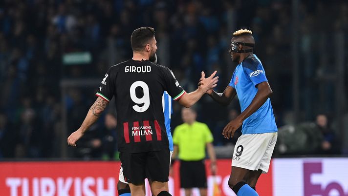 NAPLES, ITALY - APRIL 18: Olivier Giroud of AC Milan reacts with Victor Osimhen of SSC Napoli during the UEFA Champions League quarterfinal second leg match between SSC Napoli and AC Milan at Stadio Diego Armando Maradona on April 18, 2023 in Naples, Italy. (Photo by Claudio Villa/AC Milan via Getty Images) Criscitiello: “Tifosi del Napoli? Si sono sentiti di più quelli del Milan” - immagine 1