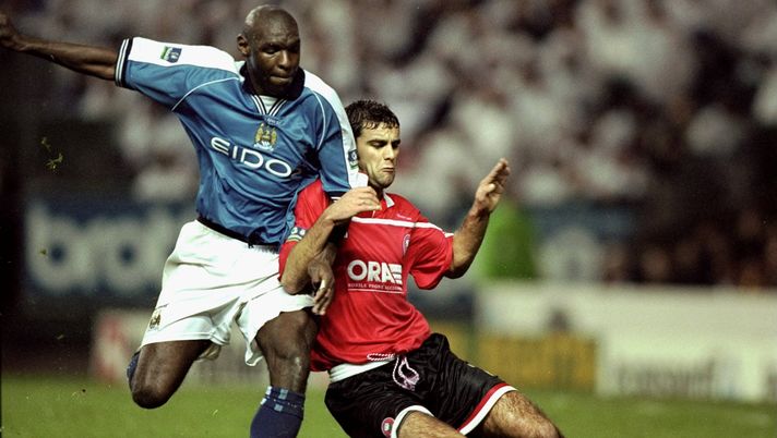 24 Nov 1999:  Shaun Goater of Manchester City battles with Chris Barker of Barnsley during the Nationwide Division One match played at Maine Road in Manchester, England. Manchester City won the game 3-1.  Mandatory Credit: Ben Radford /Allsport 