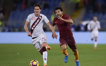  ROME, ITALY - FEBRUARY 19: AS Roma player Mohamed Salah (R) competes with FC Torino player Sasa Lukic during the Serie A match between AS Roma and FC Torino at Stadio Olimpico on February 19, 2017 in Rome, Italy. (Photo by Luciano Rossi/AS Roma via Getty Images)