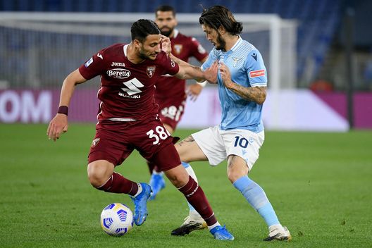 ROME, ITALY - MAY 18: Luis Alberto of SS Lazio competes for the ball with Rolando Mandragora of Torino FC during the Serie A match between SS Lazio and Torino FC at Stadio Olimpico on May 18, 2021 in Rome, Italy. The match, despite it's not postponed by Lega Serie A, will not be played as Torino team need to observe a home quarantine until midnight on Tuesday due to Covd-19. (Photo by Marco Rosi - SS Lazio/Getty Images) ROME, ITALY - MAY 18: Luis Alberto of SS Lazio competes for the ball with Rolando Mandragora of Torino FC during the Serie A match between SS Lazio and Torino FC at Stadio Olimpico on May 18, 2021 in Rome, Italy. The match, despite it's not postponed by Lega Serie A, will not be played as Torino team need to observe a home quarantine until midnight on Tuesday due to Covd-19. (Photo by Marco Rosi - SS Lazio/Getty Images)