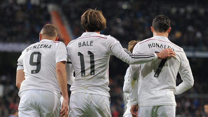 MADRID, SPAIN - MARCH 15: Gareth Bale of Real Madrid celebrates with Cristiano Ronaldo and Karim Benzema after scoring Real's opening goal during the La Liga match between Real Madrid CF and Levante UD at Estadio Santiago Bernabeu on March 15, 2015 in Madrid, Spain. (Photo by Denis Doyle/Getty Images) I grandi tridenti: ecco quelli che hanno scritto la storia degli ultimi anni- immagine 2