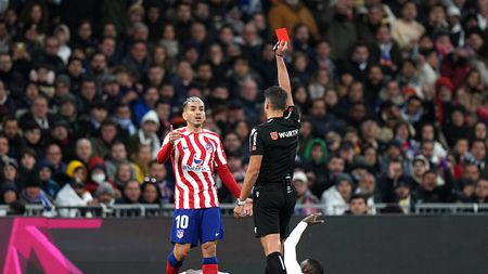 MADRID, SPAIN - FEBRUARY 25: Angel Correa of Atletico Madrid is shown a red card by Match Referee Jesus Gil Manzano during the LaLiga Santander match between Real Madrid CF and Atletico de Madrid at Estadio Santiago Bernabeu on February 25, 2023 in Madrid, Spain. (Photo by Angel Martinez/Getty Images)