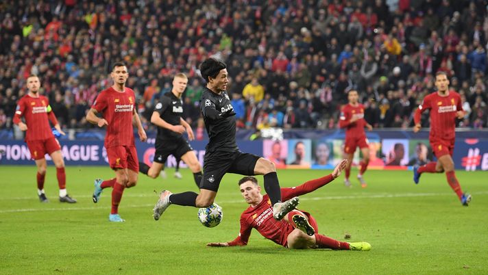 SALZBURG, AUSTRIA - DECEMBER 10: Andy Robertson of Liverpool tackles Takumi Minamino of Red Bull Salzburg during the UEFA Champions League group E match between RB Salzburg and Liverpool FC at Red Bull Arena on December 10, 2019 in Salzburg, Austria. (Photo by Michael Regan/Getty Images) SALZBURG, AUSTRIA - DECEMBER 10: Andy Robertson of Liverpool tackles Takumi Minamino of Red Bull Salzburg during the UEFA Champions League group E match between RB Salzburg and Liverpool FC at Red Bull Arena on December 10, 2019 in Salzburg, Austria. (Photo by Michael Regan/Getty Images)