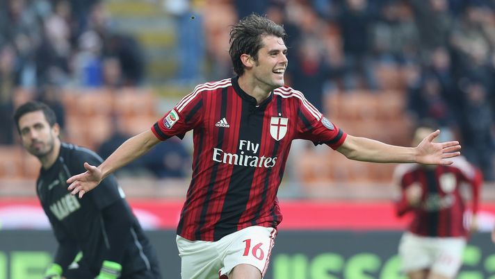 MILAN, ITALY - JANUARY 06:  Andrea Poli of Milan celebrates after scoring the opening goal during the Serie A match between AC Milan and US Sassuolo Calcio at Stadio Giuseppe Meazza on January 6, 2015 in Milan, Italy.  (Photo by Maurizio Lagana/Getty Images) 