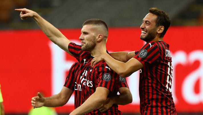 MILAN, ITALY - JULY 07: Ante Rebic (L) of AC Milan celebrates his goal with his team-mate Hakan Calhanoglu (R) aduring the Serie A match between AC Milan and Juventus at Stadio Giuseppe Meazza on July 7, 2020 in Milan, Italy. (Photo by Marco Luzzani/Getty Images) MILAN, ITALY - JULY 07: Ante Rebic (L) of AC Milan celebrates his goal with his team-mate Hakan Calhanoglu (R) aduring the Serie A match between AC Milan and Juventus at Stadio Giuseppe Meazza on July 7, 2020 in Milan, Italy. (Photo by Marco Luzzani/Getty Images)