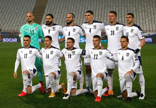 BELGRADE, SERBIA - NOVEMBER 12: The Serbia side line up for a team picture during the UEFA EURO 2020 Play-Off Final between Serbia and Scotland at Rajko Mitic Stadium on November 12, 2020 in Belgrade, Serbia. Football Stadiums around Europe remain empty due to the Coronavirus Pandemic as Government social distancing laws prohibit fans inside venues resulting in fixtures being played behind closed doors. (Photo by Srdjan Stevanovic/Getty Images) BELGRADE, SERBIA - NOVEMBER 12: The Serbia side line up for a team picture during the UEFA EURO 2020 Play-Off Final between Serbia and Scotland at Rajko Mitic Stadium on November 12, 2020 in Belgrade, Serbia. Football Stadiums around Europe remain empty due to the Coronavirus Pandemic as Government social distancing laws prohibit fans inside venues resulting in fixtures being played behind closed doors. (Photo by Srdjan Stevanovic/Getty Images)