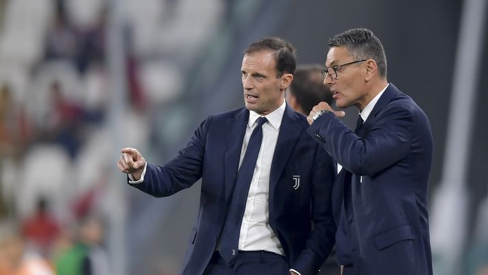 TURIN, ITALY - OCTOBER 20: Juventus coach Massimiliano Allegri with Marco Landucci during the Serie A match between Juventus and Genoa CFC at Allianz Stadium on October 20, 2018 in Turin, Italy. (Photo by Daniele Badolato - Juventus FC/Juventus FC via Getty Images) La Stampa, Landucci nel tunnel a Spalletti: “Pelato di m…. ti mangio il cuore” - immagine 1