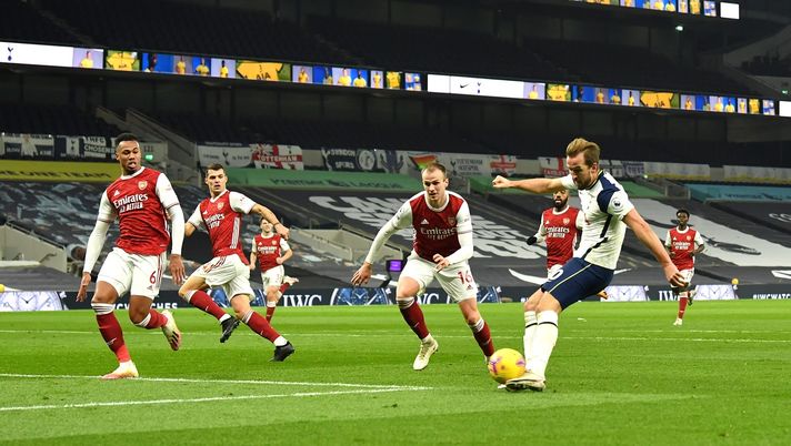 LONDON, ENGLAND - DECEMBER 06: Harry Kane of Tottenham Hotspur scores their sides second goal during the Premier League match between Tottenham Hotspur and Arsenal at Tottenham Hotspur Stadium on December 06, 2020 in London, England. A limited number of fans (2000) are welcomed back to stadiums to watch elite football across England. This was following easing of restrictions on spectators in tiers one and two areas only. (Photo by Glyn Kirk - Pool/Getty Images) LONDON, ENGLAND - DECEMBER 06: Harry Kane of Tottenham Hotspur scores their sides second goal during the Premier League match between Tottenham Hotspur and Arsenal at Tottenham Hotspur Stadium on December 06, 2020 in London, England. A limited number of fans (2000) are welcomed back to stadiums to watch elite football across England. This was following easing of restrictions on spectators in tiers one and two areas only. (Photo by Glyn Kirk - Pool/Getty Images)