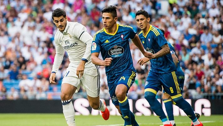 MADRID - AUGUST 27: Alvaro Morata of Real Madrid (l) and Facundo Roncaglia of Celta de Vigo fight for the ball during their La Liga match at the Santiago Bernabeu Stadium between Real Madrid and RC Celta de Vigo on 27 August 2016 in Madrid, Spain. (Photo by Power Sport Images/Getty Images) 