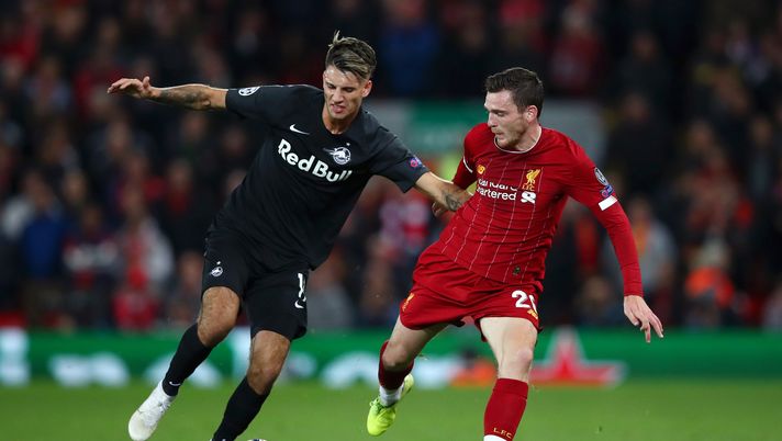 LIVERPOOL, ENGLAND - OCTOBER 02: Andy Robertson of Liverpool anc Dominik Szoboszlai of Red Bull Salzburg during the UEFA Champions League group E match between Liverpool FC and RB Salzburg at Anfield on October 02, 2019 in Liverpool, United Kingdom. (Photo by Clive Brunskill/Getty Images) 