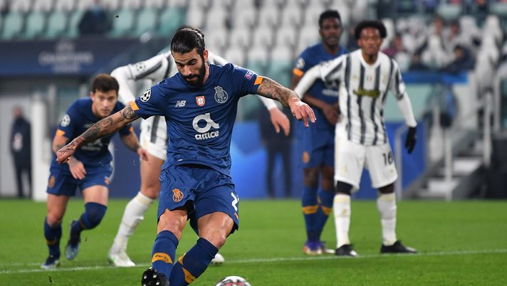 TURIN, ITALY - MARCH 09: Sergio Oliveira of Porto scores their side's first goal from the penalty spot during the UEFA Champions League Round of 16 match between Juventus and FC Porto at Juventus Arena on March 09, 2021 in Turin, Italy. Sporting stadiums around Italy remain under strict restrictions due to the Coronavirus Pandemic as Government social distancing laws prohibit fans inside venues resulting in games being played behind closed doors. (Photo by Valerio Pennicino/Getty Images) TURIN, ITALY - MARCH 09: Sergio Oliveira of Porto scores their side's first goal from the penalty spot during the UEFA Champions League Round of 16 match between Juventus and FC Porto at Juventus Arena on March 09, 2021 in Turin, Italy. Sporting stadiums around Italy remain under strict restrictions due to the Coronavirus Pandemic as Government social distancing laws prohibit fans inside venues resulting in games being played behind closed doors. (Photo by Valerio Pennicino/Getty Images)