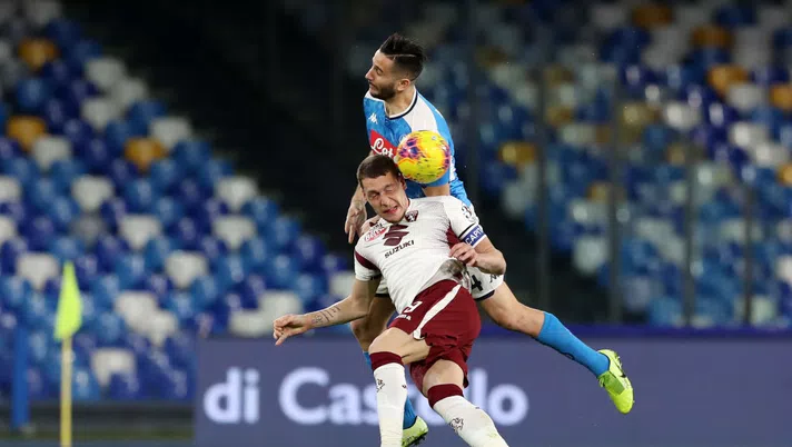 NAPLES, ITALY - FEBRUARY 29: Kostantinos Manolas of SSC Napoli competes for the ball with Andrea Belotti of Torino FC during the Serie A match between SSC Napoli and  Torino FC at Stadio San Paolo on February 29, 2020 in Naples, Italy. (Photo by Francesco Pecoraro/Getty Images)