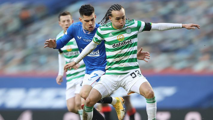 GLASGOW, SCOTLAND - JANUARY 02: Ianis Hagi of Rangers vies with Diego Laxalt of Celtic during the Ladbrokes Scottish Premiership match between Rangers and Celtic at Ibrox Stadium on January 02, 2021 in Glasgow, Scotland. The match will be played without fans, behind closed doors as a Covid-19 precaution. (Photo by Ian MacNicol/Getty Images) GLASGOW, SCOTLAND - JANUARY 02: Ianis Hagi of Rangers vies with Diego Laxalt of Celtic during the Ladbrokes Scottish Premiership match between Rangers and Celtic at Ibrox Stadium on January 02, 2021 in Glasgow, Scotland. The match will be played without fans, behind closed doors as a Covid-19 precaution. (Photo by Ian MacNicol/Getty Images)