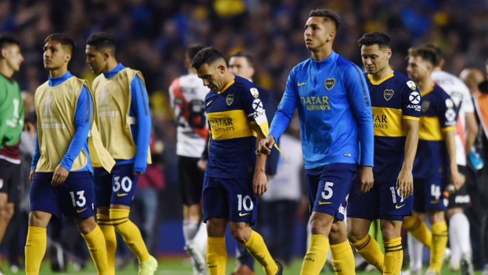 BUENOS AIRES, ARGENTINA - OCTOBER 22: Mauro Zarate of Boca Juniors, Carlos Tevez of Boca Juniors and Agustin Almendra of Boca Juniors look dejected after the Semifinal second leg match between Boca Juniors and River Plate as part of Copa CONMEBOL Libertadores 2019 at Estadio Alberto J. Armando on October 22, 2019 in Buenos Aires, Argentina. (Photo by Marcelo Endelli/Getty Images) BUENOS AIRES, ARGENTINA - OCTOBER 22: Mauro Zarate of Boca Juniors, Carlos Tevez of Boca Juniors and Agustin Almendra of Boca Juniors look dejected after the Semifinal second leg match between Boca Juniors and River Plate as part of Copa CONMEBOL Libertadores 2019 at Estadio Alberto J. Armando on October 22, 2019 in Buenos Aires, Argentina. (Photo by Marcelo Endelli/Getty Images)