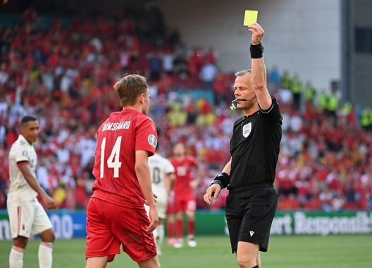 COPENHAGEN, DENMARK - JUNE 17: Match Referee, Bjoern Kuipers shows a yellow card to Mikkel Damsgaard of Denmark during the UEFA Euro 2020 Championship Group B match between Denmark and Belgium at Parken Stadium on June 17, 2021 in Copenhagen, Denmark. (Photo by Jonathan Nackstrand - Pool/Getty Images) COPENHAGEN, DENMARK - JUNE 17: Match Referee, Bjoern Kuipers shows a yellow card to Mikkel Damsgaard of Denmark during the UEFA Euro 2020 Championship Group B match between Denmark and Belgium at Parken Stadium on June 17, 2021 in Copenhagen, Denmark. (Photo by Jonathan Nackstrand - Pool/Getty Images)