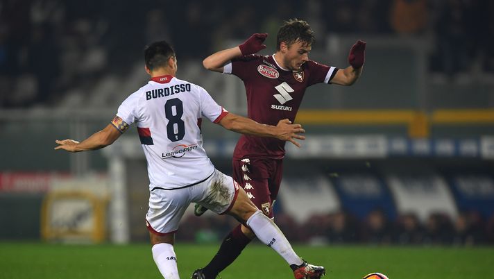 TURIN, ITALY - DECEMBER 22:  Nicolas Burdisso (L) of Genoa CFC tackles Adem Ljajic of FC Torino during the Serie A match between FC Torino and Genoa CFC at Stadio Olimpico di Torino on December 22, 2016 in Turin, Italy.  (Photo by Valerio Pennicino/Getty Images)