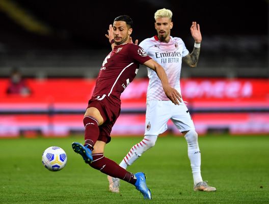 TURIN, ITALY - MAY 12: Rolando Mandragora of Torino FC stretches for the ball during the Serie A match between Torino FC and AC Milan at Stadio Olimpico di Torino on May 12, 2021 in Turin, Italy. Sporting stadiums around Italy remain under strict restrictions due to the Coronavirus Pandemic as Government social distancing laws prohibit fans inside venues resulting in games being played behind closed doors. (Photo by Valerio Pennicino/Getty Images) TURIN, ITALY - MAY 12: Rolando Mandragora of Torino FC stretches for the ball during the Serie A match between Torino FC and AC Milan at Stadio Olimpico di Torino on May 12, 2021 in Turin, Italy. Sporting stadiums around Italy remain under strict restrictions due to the Coronavirus Pandemic as Government social distancing laws prohibit fans inside venues resulting in games being played behind closed doors. (Photo by Valerio Pennicino/Getty Images)