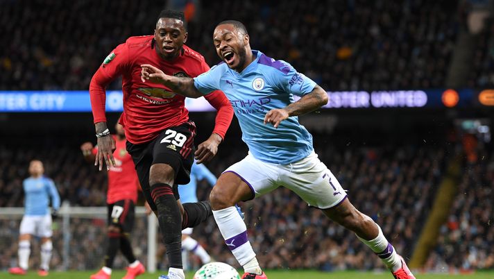 MANCHESTER, ENGLAND - JANUARY 29: Raheem Sterling of Manchester City battles for possession with Aaron Wan-Bissaka of Manchester United during the Carabao Cup Semi Final match between Manchester City and Manchester United at Etihad Stadium on January 29, 2020 in Manchester, England. (Photo by Laurence Griffiths/Getty Images) MANCHESTER, ENGLAND - JANUARY 29: Raheem Sterling of Manchester City battles for possession with Aaron Wan-Bissaka of Manchester United during the Carabao Cup Semi Final match between Manchester City and Manchester United at Etihad Stadium on January 29, 2020 in Manchester, England. (Photo by Laurence Griffiths/Getty Images)