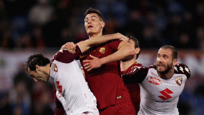 ROME, ITALY - MARCH 09:  Patrick Schick of AS Roma competes for the ball with Emiliano Moretti and Alessandro De Silvestri of Torino FC during the Serie A match between AS Roma and Torino FC at Stadio Olimpico on March 9, 2018 in Rome, Italy.  (Photo by Paolo Bruno/Getty Images) 