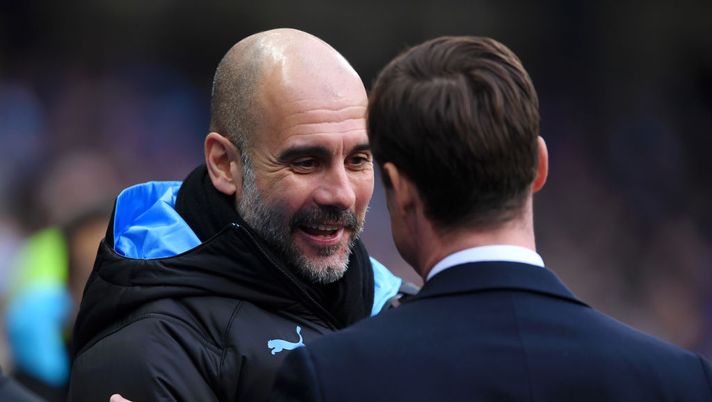 MANCHESTER, ENGLAND - JANUARY 26: Pep Guardiola, Manager of Manchester City with Scott Parker, Manager of Fulham during the FA Cup Fourth Round match between Manchester City and Fulham at Etihad Stadium on January 26, 2020 in Manchester, England. (Photo by Laurence Griffiths/Getty Images) MANCHESTER, ENGLAND - JANUARY 26: Pep Guardiola, Manager of Manchester City with Scott Parker, Manager of Fulham during the FA Cup Fourth Round match between Manchester City and Fulham at Etihad Stadium on January 26, 2020 in Manchester, England. (Photo by Laurence Griffiths/Getty Images)