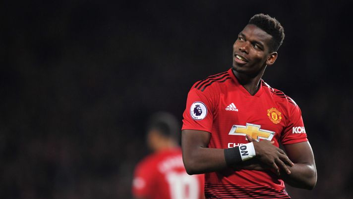 MANCHESTER, ENGLAND - DECEMBER 30: Paul Pogba of Manchester United (6) celebrates as he scores his team's first goal during the Premier League match between Manchester United and AFC Bournemouth at Old Trafford on December 30, 2018 in Manchester, United Kingdom. (Photo by Michael Regan/Getty Images) pogba