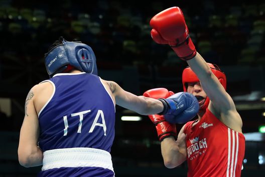 LONDON, ENGLAND - MARCH 15: Irma Testa (Blue) of Italy punches Sandra Brugger (Red) of Switzerland during the Women's Featherweight 57KG Preliminary round bout between Sandra Brugger of Switzerland and Irma Testa of Italy on Day Two of the Road to Tokyo European Boxing Olympic Qualifying Event at Copper Box Arena on March 15, 2020 in London, England. (Photo by James Chance/Getty Images) 