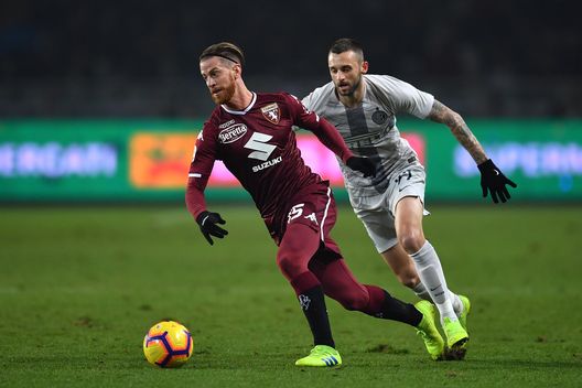 TURIN, ITALY - JANUARY 27: Cristian Ansaldi (L) of Torino FC in action against Marcelo Brozovic of FC Internazionale during the Serie A match between Torino FC and FC Internazionale at Stadio Olimpico di Torino on January 27, 2019 in Turin, Italy. (Photo by Valerio Pennicino/Getty Images) TURIN, ITALY - JANUARY 27: Cristian Ansaldi (L) of Torino FC in action against Marcelo Brozovic of FC Internazionale during the Serie A match between Torino FC and FC Internazionale at Stadio Olimpico di Torino on January 27, 2019 in Turin, Italy. (Photo by Valerio Pennicino/Getty Images)