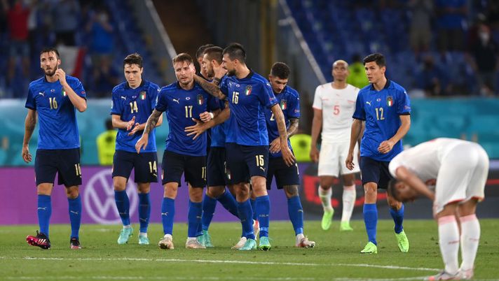 ROME, ITALY - JUNE 16: Ciro Immobile of Italy is congratulated by Francesco Acerbi of Italy after scoring the third gaol during the UEFA Euro 2020 Championship Group A match between Italy and Switzerland at Olimpico Stadium on June 16, 2021 in Rome, Italy. (Photo by Mike Hewitt/Getty Images) 