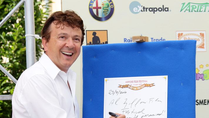 GIFFONI VALLE PIANA, ITALY - JULY 23:  TV Presenter and Singer Enzo Ghinazzi also known as Pupo attends a photocall during Giffoni Experience 2010 on July 23, 2010 in Giffoni Valle Piana, Italy.  (Photo by Vittorio Zunino Celotto/Getty Images)  GIFFONI VALLE PIANA, ITALY - JULY 23:  TV Presenter and Singer Enzo Ghinazzi also known as Pupo attends a photocall during Giffoni Experience 2010 on July 23, 2010 in Giffoni Valle Piana, Italy.  (Photo by Vittorio Zunino Celotto/Getty Images)